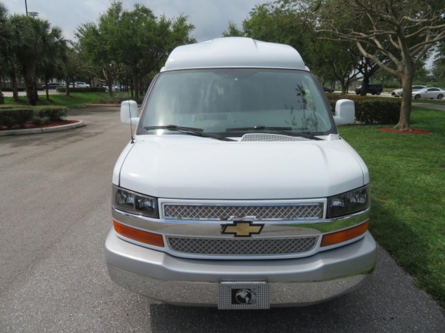 2010 White /Gray Chevrolet Express (1GNUGCD48A1) , located at 4301 Oak Circle #19, Boca Raton, FL, 33431, (954) 561-2499, 26.388861, -80.084038 - You are looking at a Gorgeous 2010 Chevy Express Handicap Wheelchair Conversion Van Explorer Limited SE with 31K Original Miles, Braun Century 750lb Side Entry Wheelchair lift, Tie Down System in the Floor, Rear Entertainment with Flat Screen TV/DVD, Leather Interior, Rear Power Folding Bench Seat/b - Photo#21